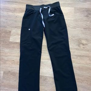 Black fig scrubs size XS hardly worn.